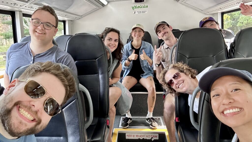 Image of staff on a bus.
